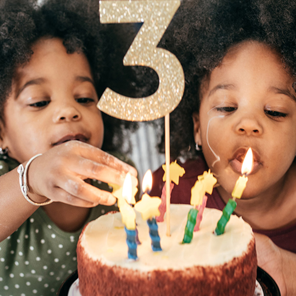 Kids with birthday cake